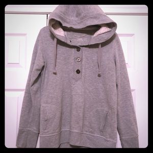 Grey pullover seater with fuzzy hood